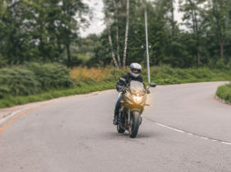 A motorcyclist on a bend in the road